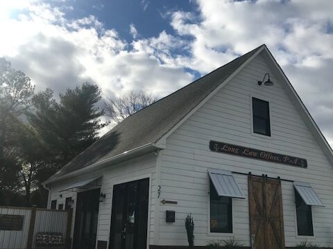 A law office in a white clapboard building