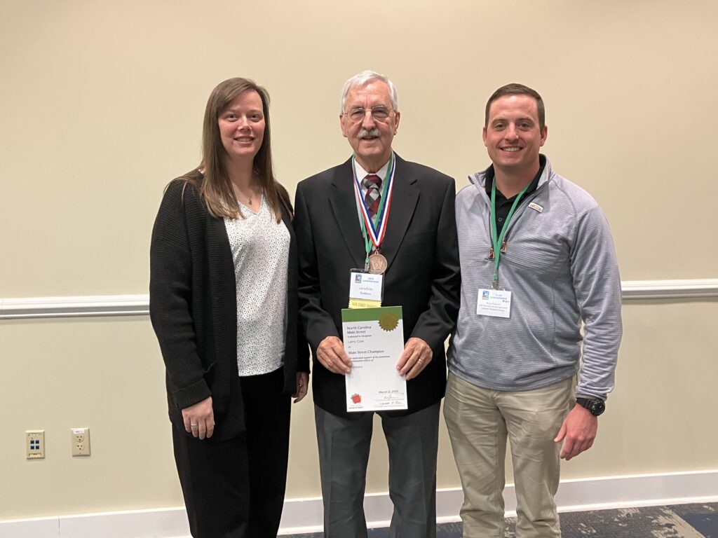 Larry Cole with URG Board members Crystal Cole and Bryan Eatmon